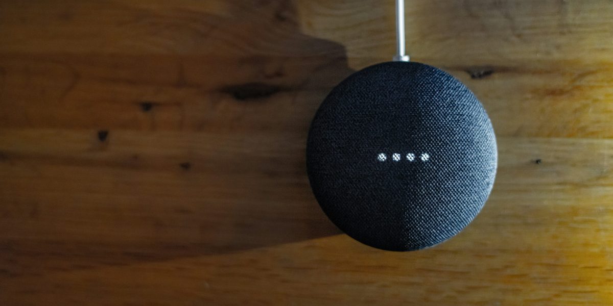 Smart Home Security blue ball on a wooden surface