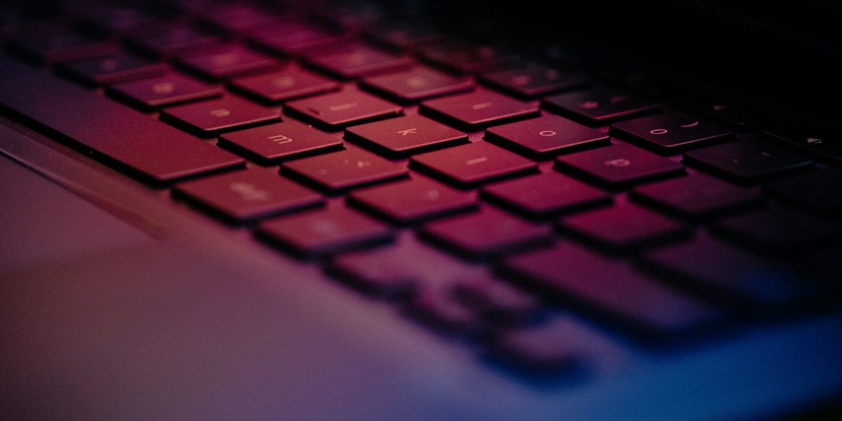 IT asset disposition a-close-up-of-a-keyboard-with-a-blurry-background