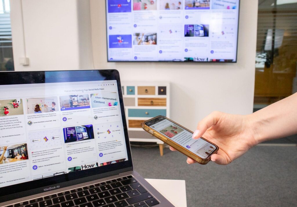BYOD Policy: 14 Essential Questions Before You Say Yes 3 Phones, a tablet, and a laptop on an office desk