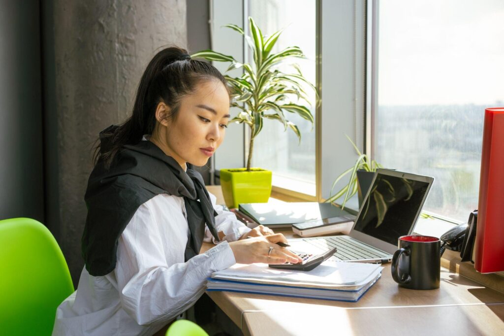 Woman working at a computer in an office